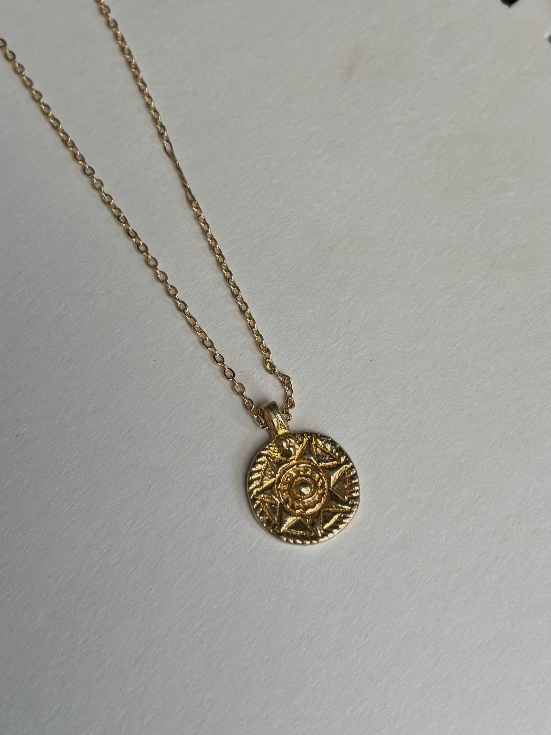 Sunburst Brass Medallion Pendant