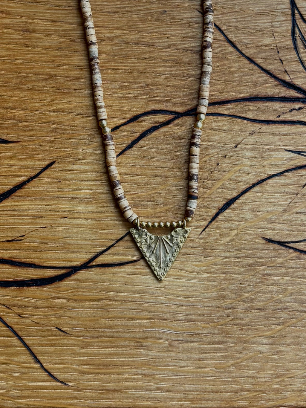 Solara — Brass Triangle & Coconut Bead Necklace