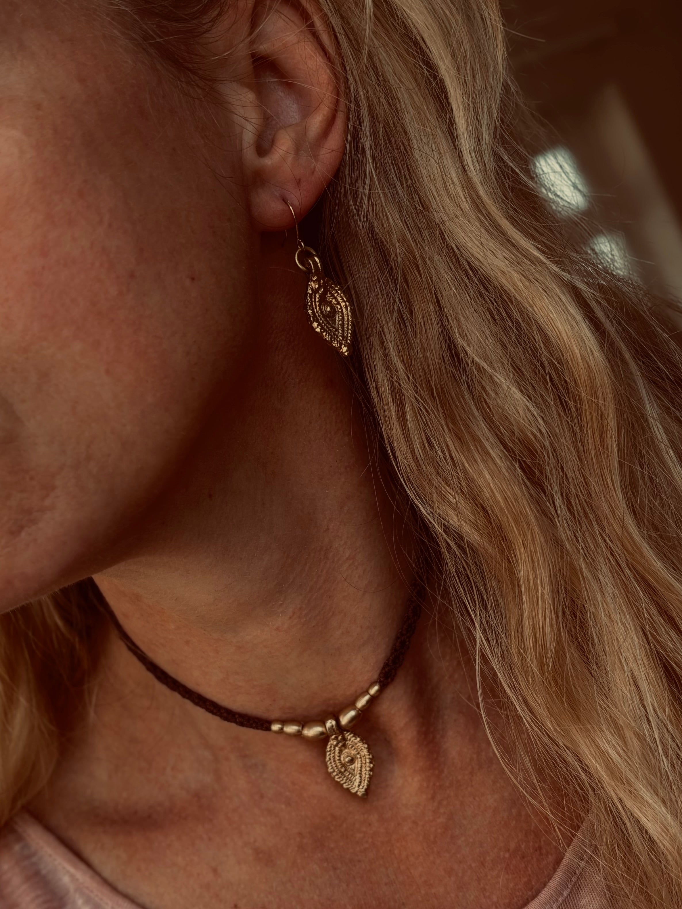 The Oko Kaya charm earrings