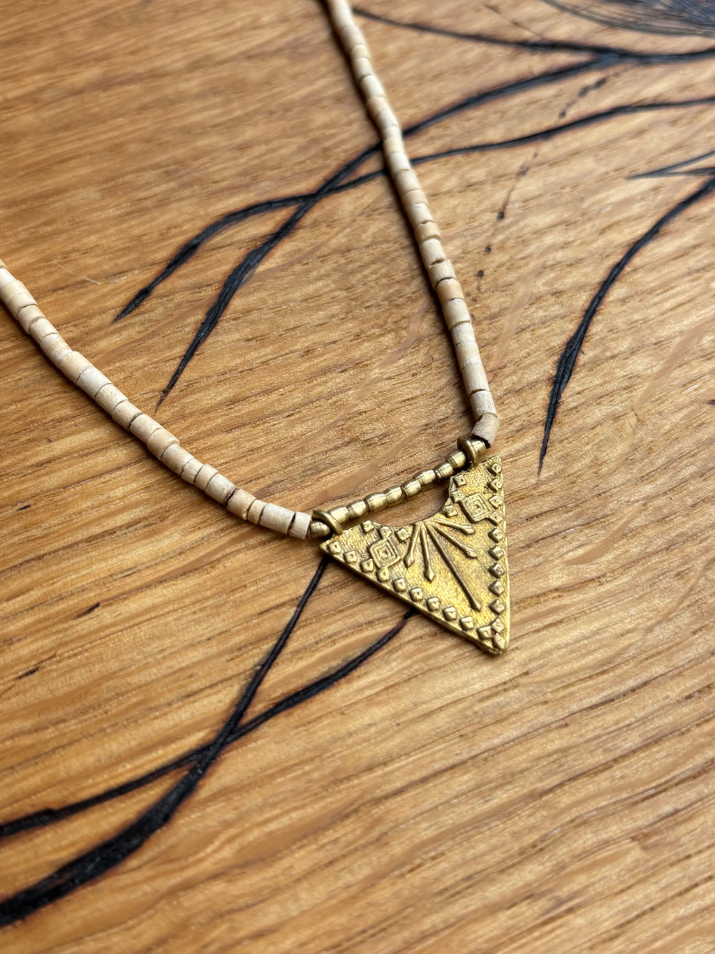 Solara — Brass Triangle & Coconut Bead Necklace