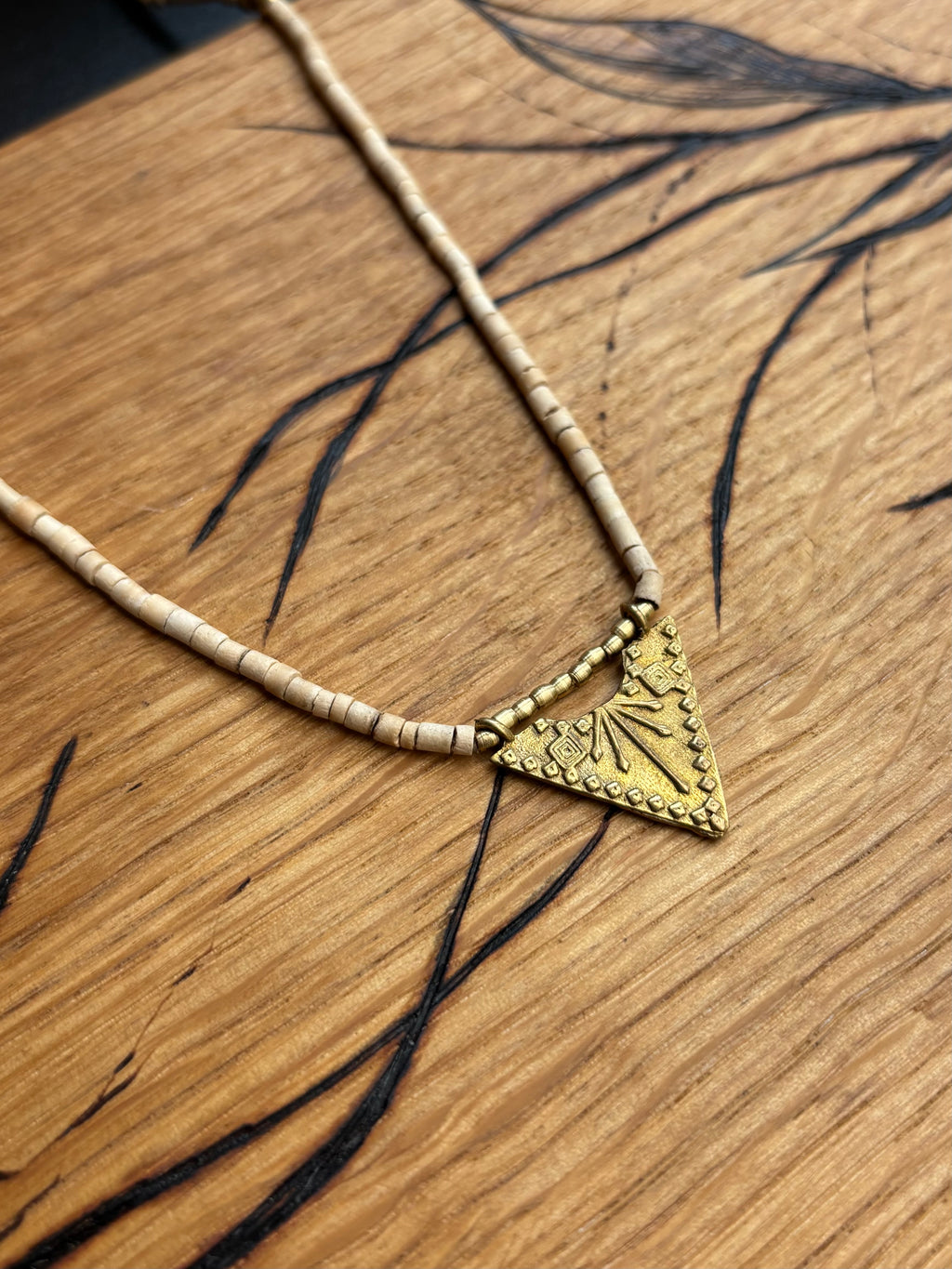 Solara — Brass Triangle & Coconut Bead Necklace
