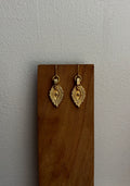 The Oko Kaya charm earrings